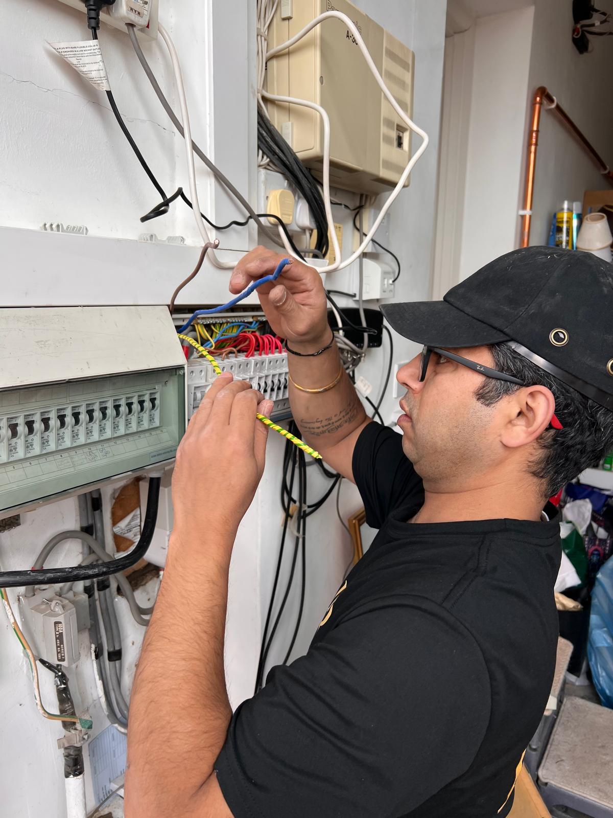 Electrician working on a distribution board